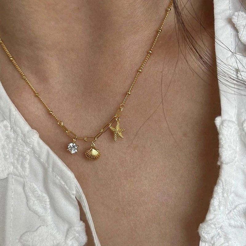 Women Golden Sea Charm Necklace (Anti Tarnish)
