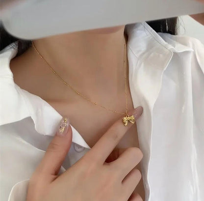 Golden Minimal Bow Women Necklace (Anti Tarnish)